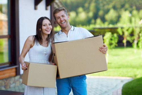Family unpacking in their new home in Paddington